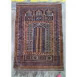 Persian rug, the brown ground with rich blue, cream and light brown decoration, approx 126cm x 88cm
