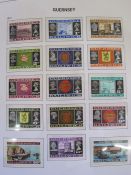 Guernsey collection of stamps in SG printed album UM few wartime issues appears complete to 2002 (