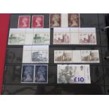 Stockbook with £100+ mint decimal stamps including £10 and 4 and 5 values and many sheets, etc (1)