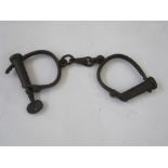 Pair Haitt cast iron handcuffs with key