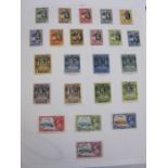 Album of Gambia stamps from King George V, Gibraltar from Queen Victoria including King Edward