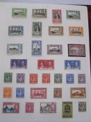 Album of St Lucia stamps from Queen Victoria to circa 1980 and album of St Vincent stamps from