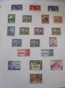 Three albums of stamps, Grenada George V to 10s mounted mint to modern and mounted, Kiriabate Tuvalu