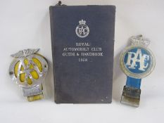 Metal and enamel AA badge, No.6 B82006, plastic and metal RAC badge and RAC 1958 guide and