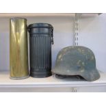 WW2 German Helmet with original paint and leather liner, WW2 German gas mask case and WW2 shell case