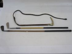 Hunting crop with horn handle, metal collar and plaited whip, a Jock Hutchinson putting golf club