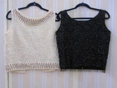 Heavily beaded and sequinned black evening top, a white sequinned and embroidered beaded