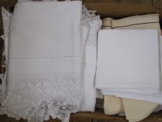 Large quantity of table linen including damask, drawn and thread tablecloths, crochet table mats,