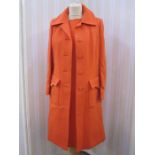 Tricosa crimplene orange suit with matching shift dress 1960's/70's, a cashmere coat labelled