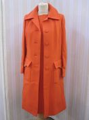 Tricosa crimplene orange suit with matching shift dress 1960's/70's, a cashmere coat labelled