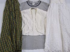 Quantity of assorted vintage shirts, skirts etc. including a tartan taffeta skirt, a pink cotton