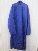 Chinese blue padded silk robe, with small ball metal fastenings, faced with turquoise, and a pair of