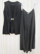 Black waistcoat with vintage style buckle fastening to the front, a black, white polka dotted silk