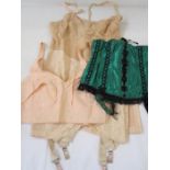 Vintage corset, with suspenders, assorted vintage and later underwear and a green satin corset