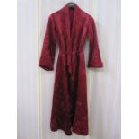 Vintage satin quilted dressing gown in maroon with a satin tie belt and scalloped edges