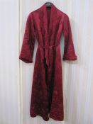 Vintage satin quilted dressing gown in maroon with a satin tie belt and scalloped edges