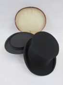 Two collapsible opera hats, one  labelled Harrods Limited, London, another labelled Bennetts,