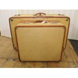 Leather canvas and leather suitcase with a smaller matching made by Victor Luggage, the smaller case