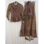 Victorian walking outfit comprising fitted top and skirt, buttoned front, fitted waist,, a sash ,had
