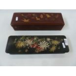 Two Oriental lacquered glove boxes, one red lacquer with hinge lid and one black lacquer with red