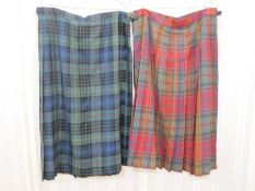 Two ladies' Scottish pure new wool kilts labelled James Pringle, Weavers of Inverness, sizes 22