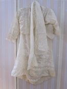 An Edwardian deconstructed cream and embroidered, full length cotton dress, a small lace and