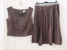 Brown and black pleated skirt with matching top labelled Cresta, a cream and gold lurex sleeveless