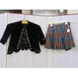 Black velvet waistcoat with lace trim, a tweed waistcoat and kilt skirt and a velvet jacket with