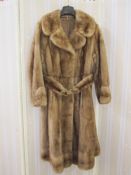 1970's full length mink coat banded hem, cuff sleeves with belt and a metal buckle