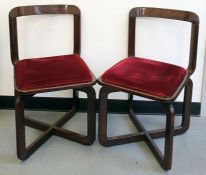 In the style of Willy Rizzo, a set of four, circa 1970, chestnut framed board room chairs, with