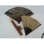 A Chinese painted paper fan, various painted figures to include warriors, Buddhas and serpents,