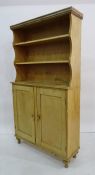 Vintage pine dresser, the open shelves above two cupboard doors, turned supports, 99cm x 182cm