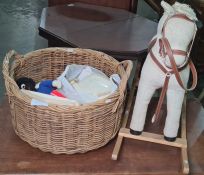 Small corduroy rocking horse with saddle and bridle, a large log basket, two carnival fancy dress