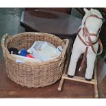 Small corduroy rocking horse with saddle and bridle, a large log basket, two carnival fancy dress