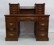 Late 19th/early 20th century oak desk, the two banks of four drawers with three-quarter galleried