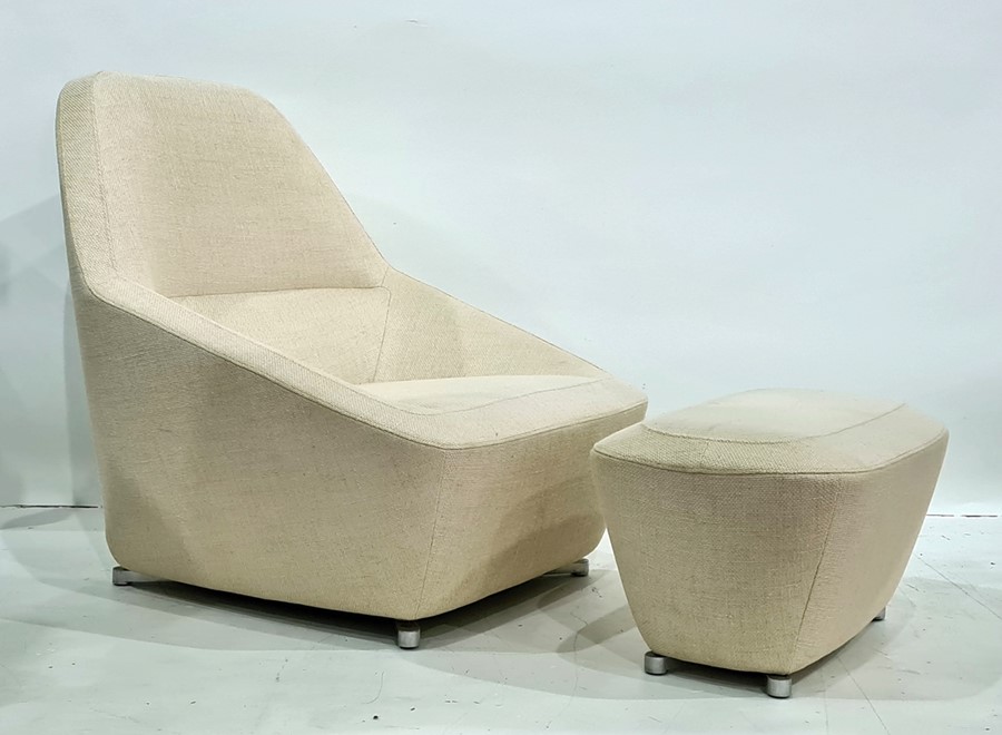 Modern Ligne Roset armchair with footstool, cream ground upholstery  Condition ReportThe chair and