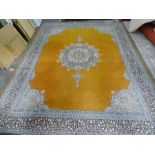 Eastern mustard ground rug with central medallion, stepped border, 374cm x 278cm