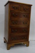 20th century yew narrow chest of two short over four long drawers, 47 x 84cm