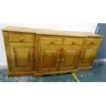 20th century pine breakfront sideboard with four drawers and four cupboard doors, plinth base, 202 x