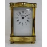Mid 20th century carriage clock in brass case, the white face with Roman numerals marked 'Angelus'