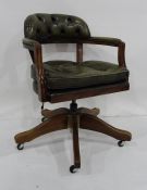 20th century office swivel "Captain's" chair in green leatherette upholstery