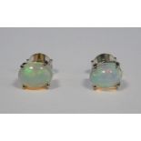 Pair of silver and white Ethiopian oval cabochon opal stud earrings