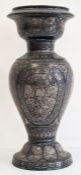 Indian metal baluster vase decorated with silvered jardinieres of flowers, within oval foliate