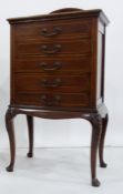 Early 20th century mahogany ebony and boxwood strung chest of five short drawers on cabriole