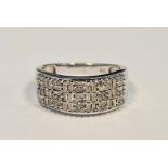 Diamond and silver pave set ring set variously rectangular cut stones Condition ReportSize R/S