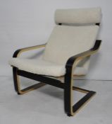 Ikea chair in mock sheepskin upholstered finish