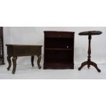 Round wine table on tripod stand, a work table with vine carving, a black painted coffee table and a
