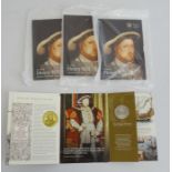 Four uncirculated commemorative Henry VIII £5 coins