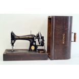 Singer sewing machine in wooden case
