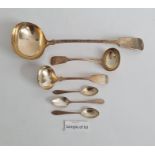 10 assorted silver teaspoons, other plated teaspoons, a large silver-plated ladle, two smaller and a